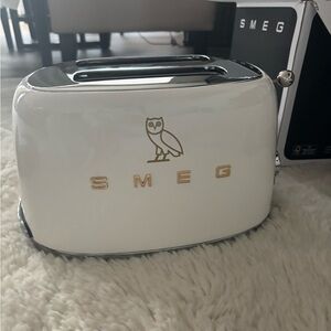 **SOLD**Smeg White Toaster with Gold Accents